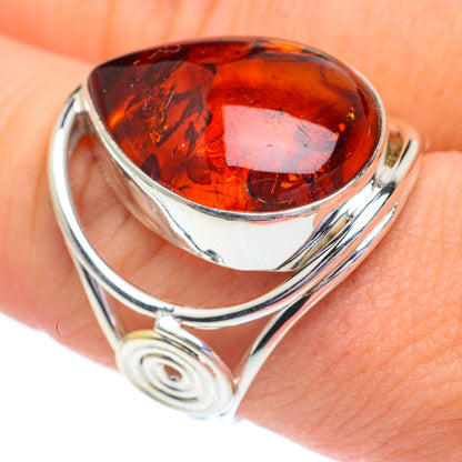 Oval amber cabochon sterling silver ring with spiral band detail, size 8.5