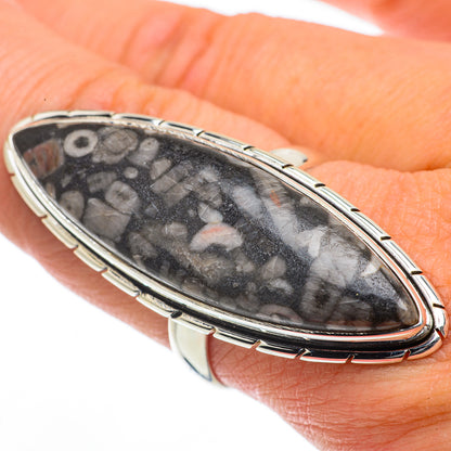 925 sterling silver ring with oval jasper cabochon and patterned bezel, dark speckles.