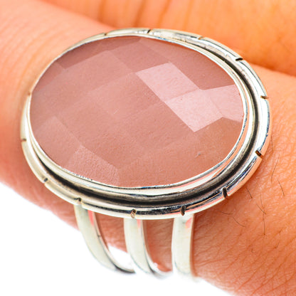 Oval peach moonstone ring close-up, faceted stone in silver bezel, size 9.5