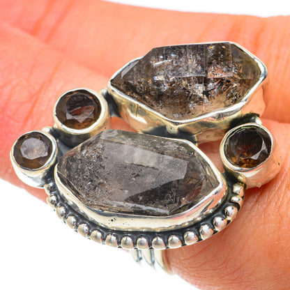 Sterling silver ring with smoky quartz center and four faceted gemstones, size 7