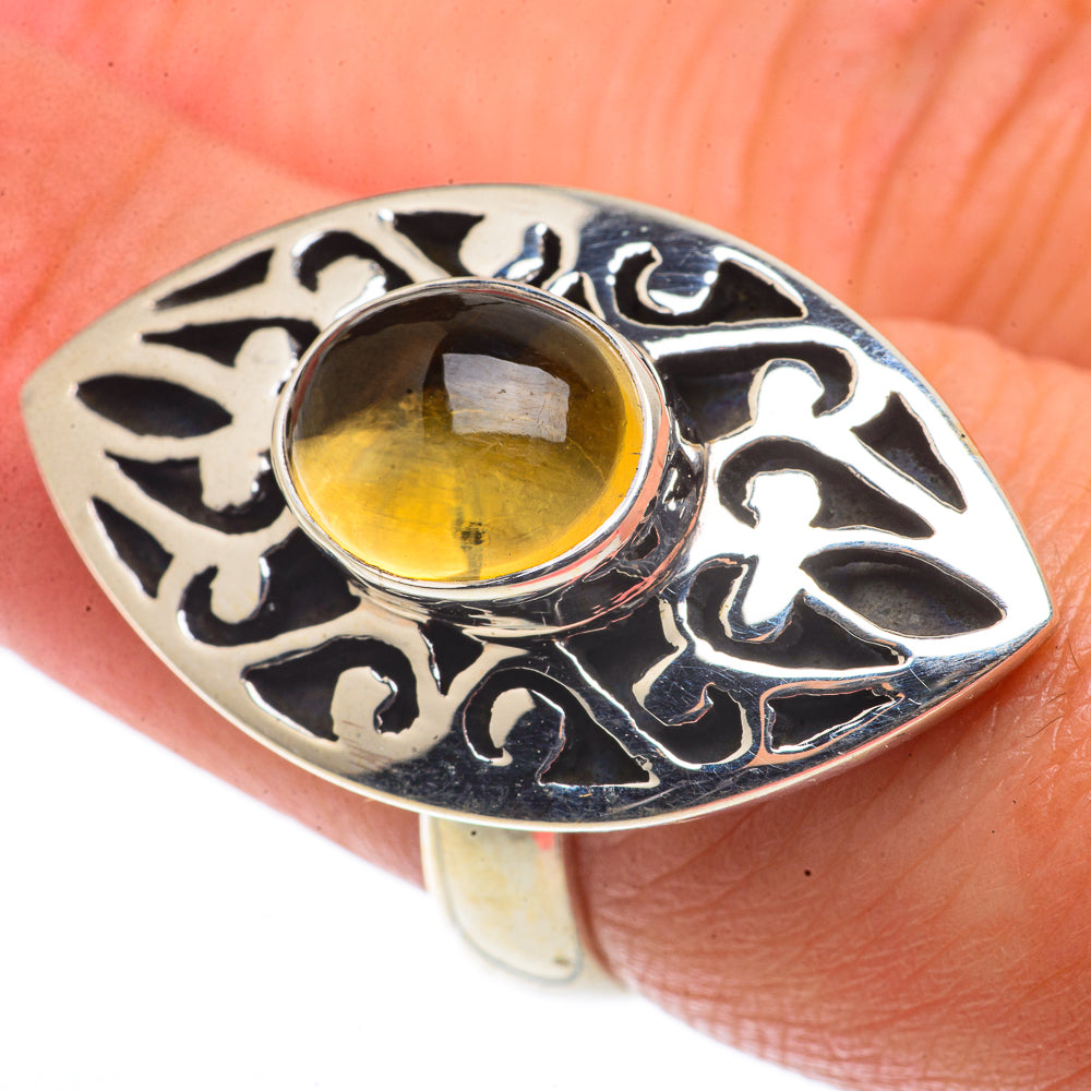 Sterling silver ring with oval yellow gemstone and black filigree, size 7.25