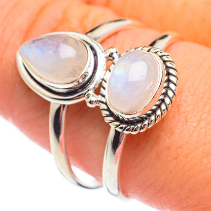 Sterling silver moonstone ring with two oval opalescent stones and braided bezels