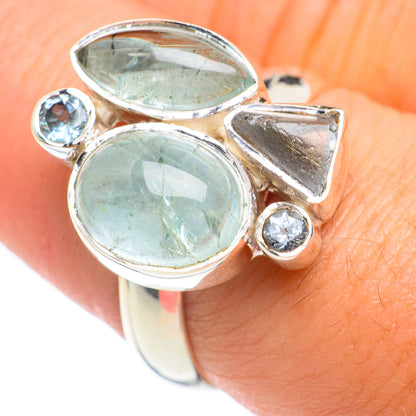 Sterling silver adjustable ring with two large oval aqua gemstones and two round accents
