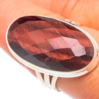 Oval red tiger eye ring with polished 925 sterling silver bezel, close-up
