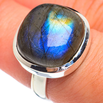 Labradorite ring in 925 sterling silver with oval dark stone, vivid blue flash top view