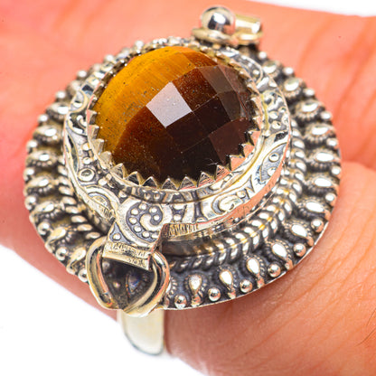 Sterling silver tiger eye ring with faceted oval stone and detailed bead-and-scroll setting