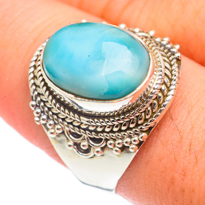 Larimar 925 sterling silver ring with oval turquoise cabochon and textured rope border