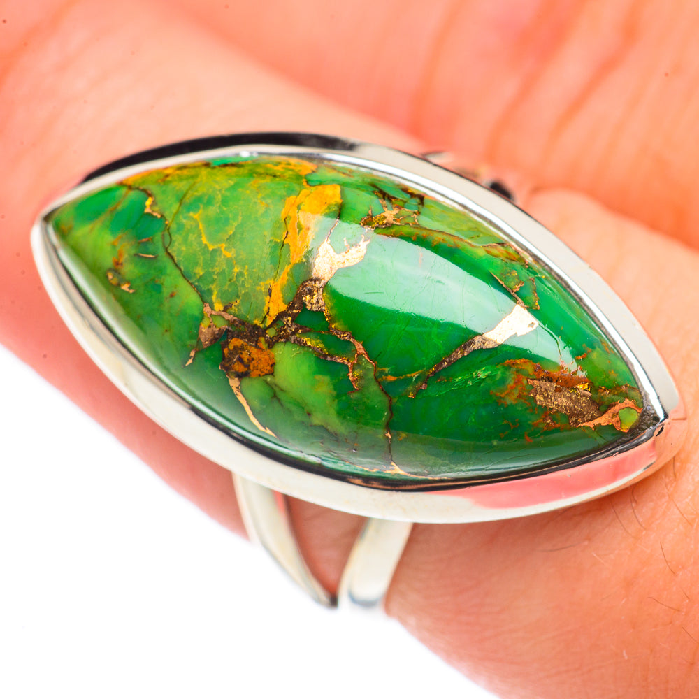Green turquoise oval cabochon ring in silver bezel, detailed web pattern