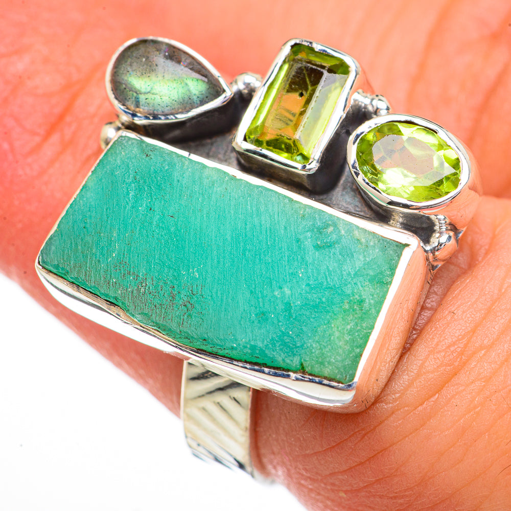 Sterling silver ring with large green rectangle gemstone and two green side stones