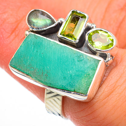 Sterling silver ring with large green rectangle gemstone and two green side stones