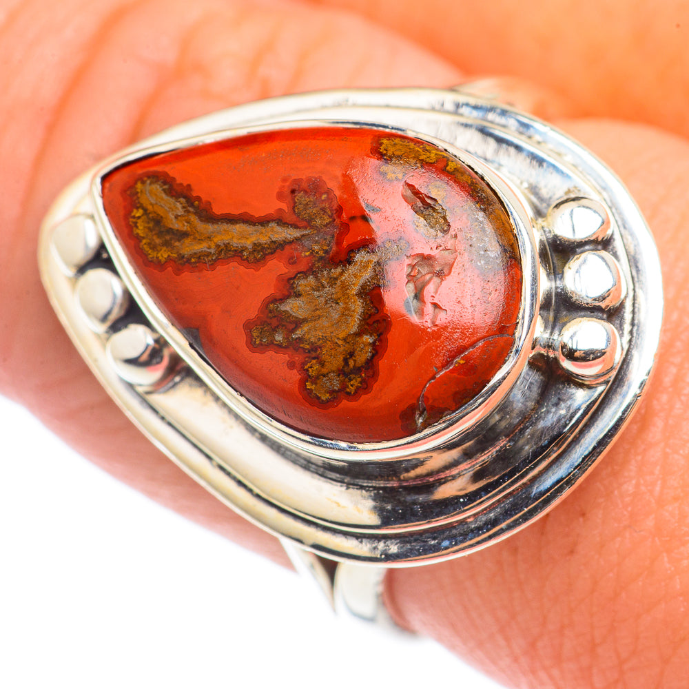 Moroccan agate ring with oval red stone, silver bezel and rounded side studs