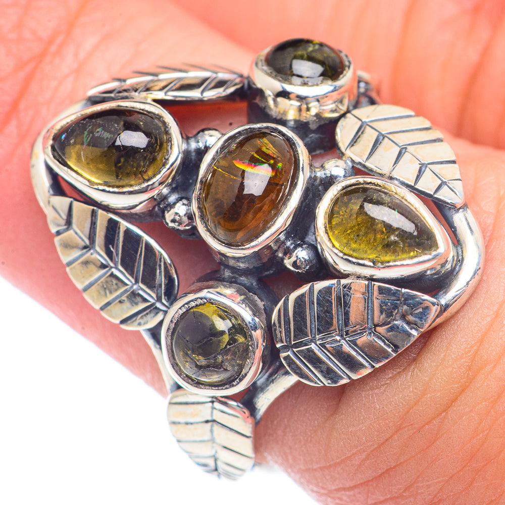 Sterling silver tourmaline ring with five oval amber/olive stones and carved band