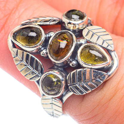 Sterling silver tourmaline ring with five oval amber/olive stones and carved band