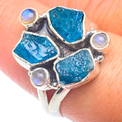 Sterling silver ring with four rough blue stones and round moonstone cabochons