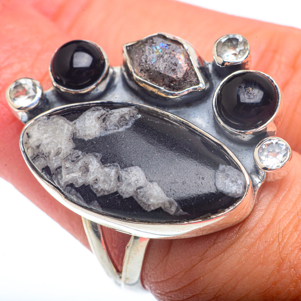 Sterling silver gemstone ring with black oval druzy stone, clear round stones, black bezels