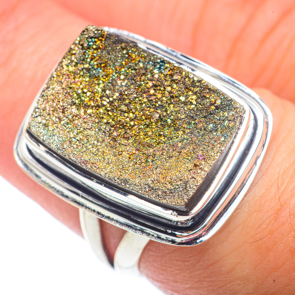 Sterling silver rectangular drusy pyrite ring, hand-held close-up of gold sparkle surface
