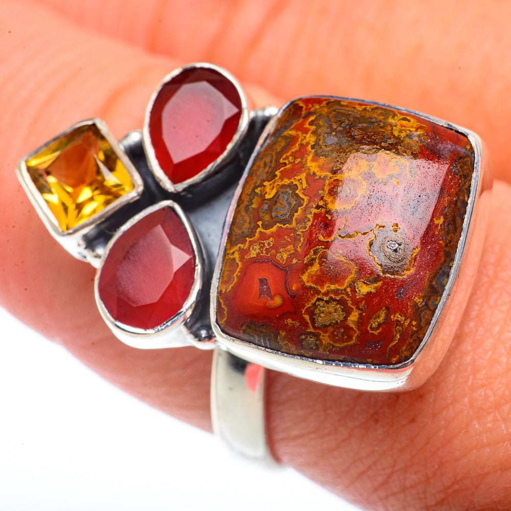 Sterling silver multi-stone ring with yellow square stone, red round stones, and red jasper panel