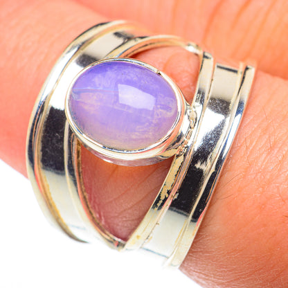 Polished 925 sterling silver ring with oval blue opal cabochon and wide band