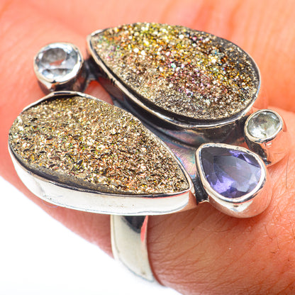 Sterling silver ring with two gold druzy ovals and a purple teardrop center stone