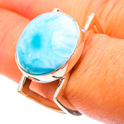 Oval turquoise stone larimar-style ring with sterling silver bezel and three prongs