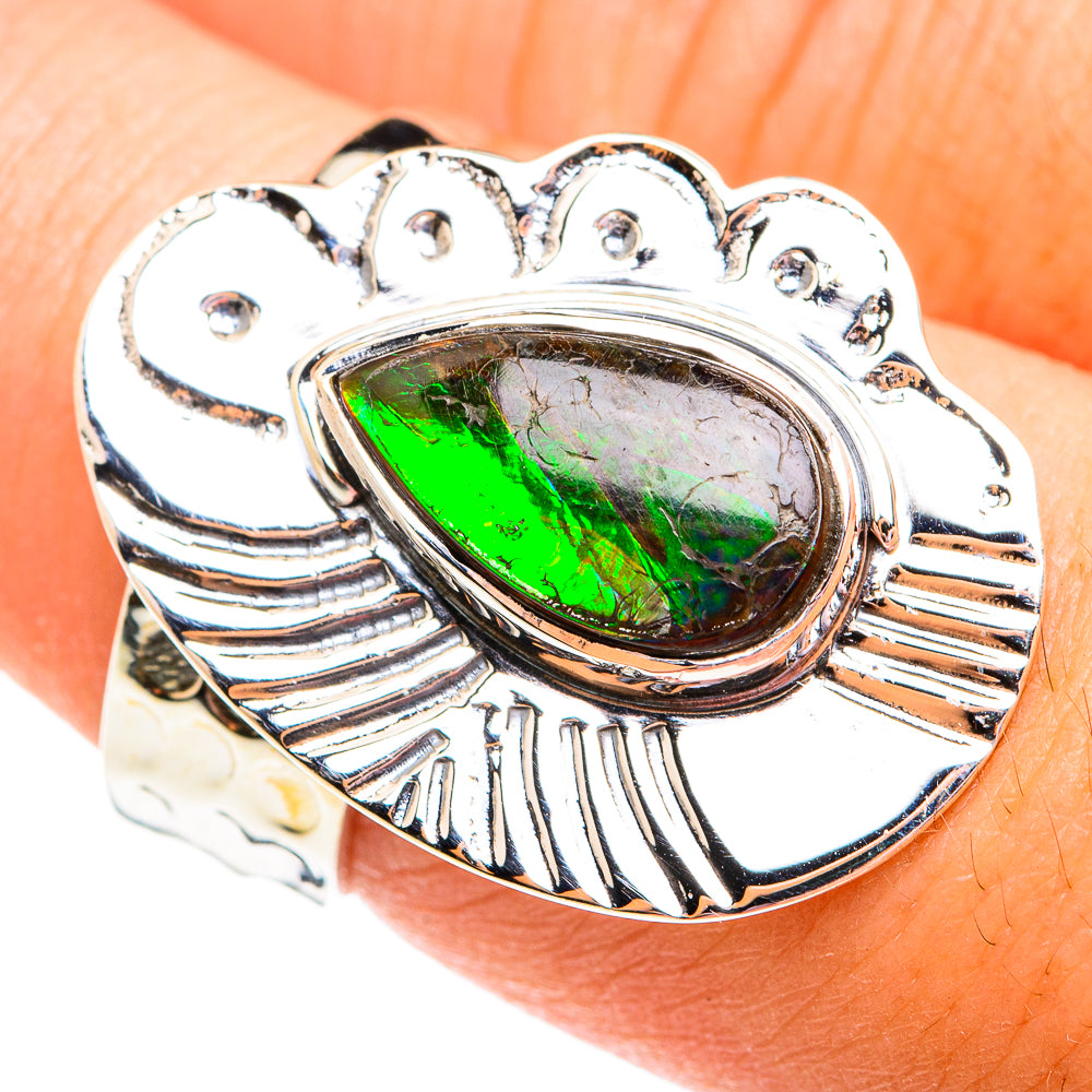 Sterling silver ammolite ring with oval green iridescent gemstone, scalloped top