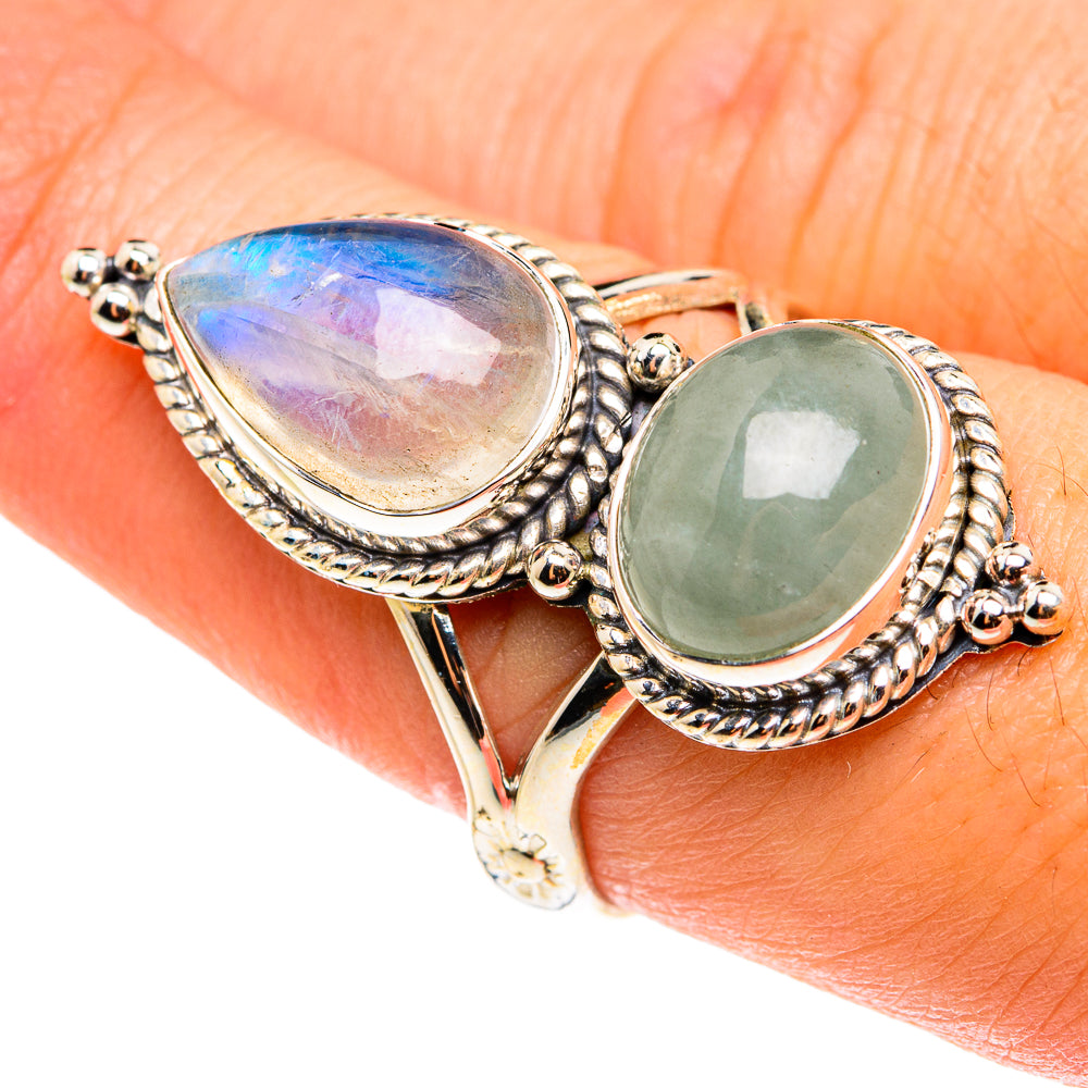 Sterling silver two-stone ring with teardrop rainbow moonstone and green gemstone accents