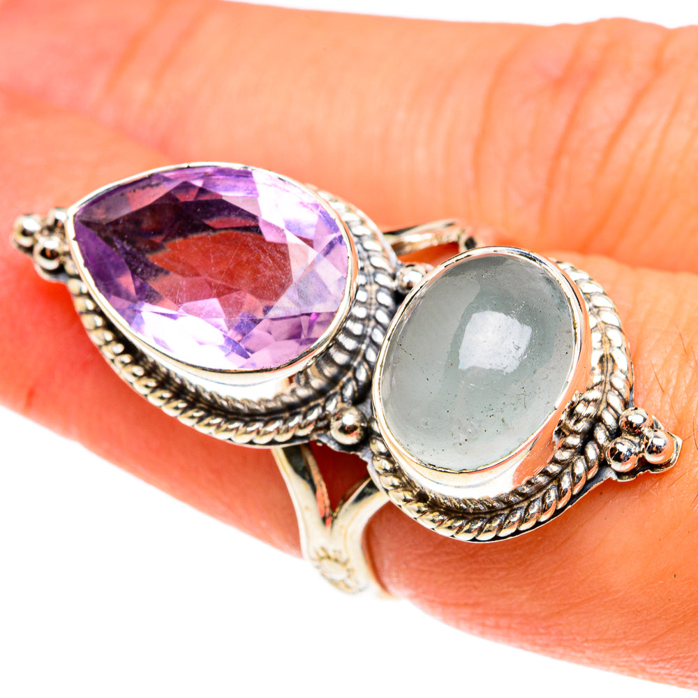 Sterling silver ring with large oval faceted amethyst and oval aquamarine cabochon