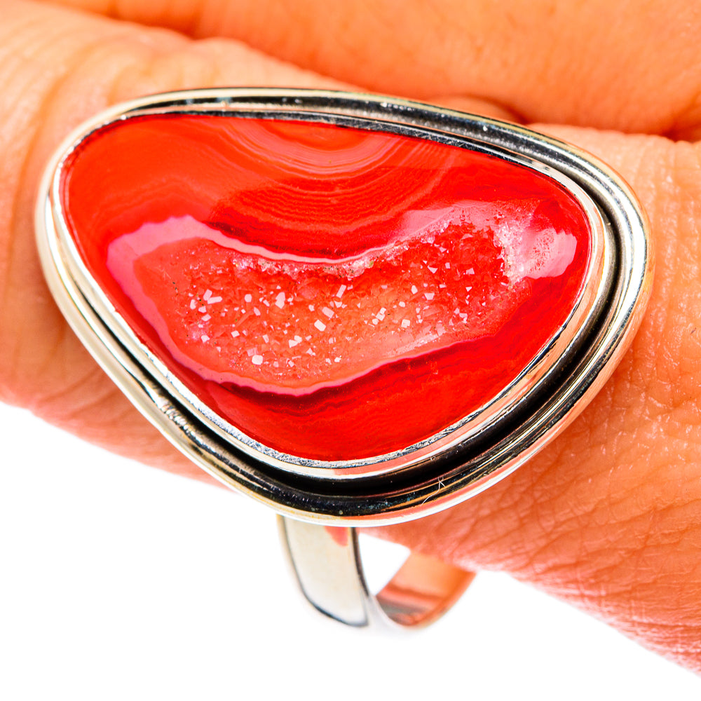 Teardrop red agate drusy ring in sterling silver with glittering druzy surface on hand