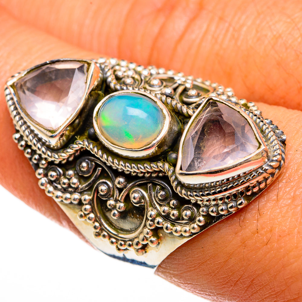 Large ornate silver ring with oval opal and two triangular stones, antique filigree setting
