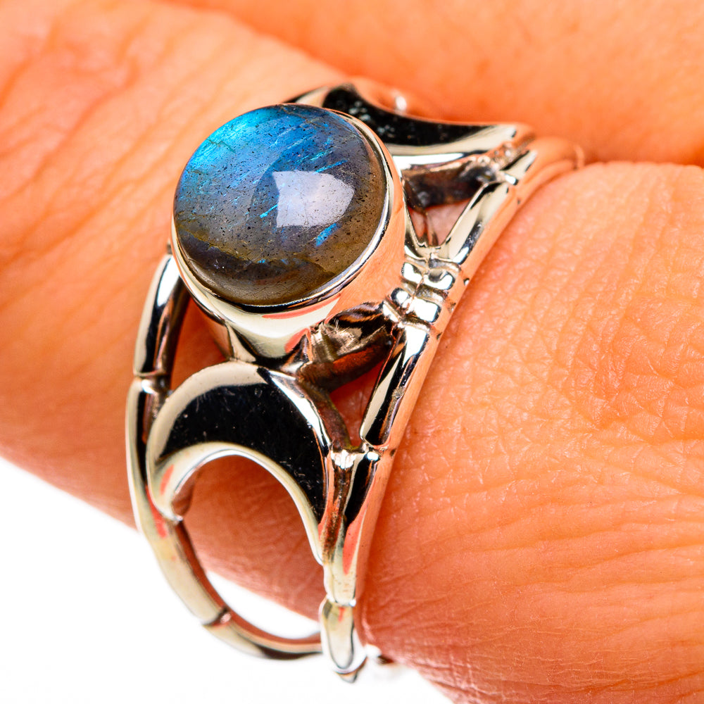 Sterling silver labradorite ring with oval dark blue-gray stone, ornate openwork