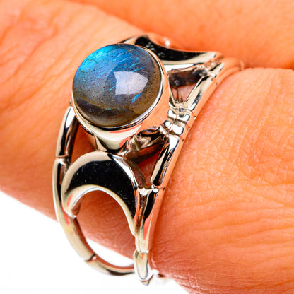 Sterling silver labradorite ring with oval dark blue-gray stone, ornate openwork