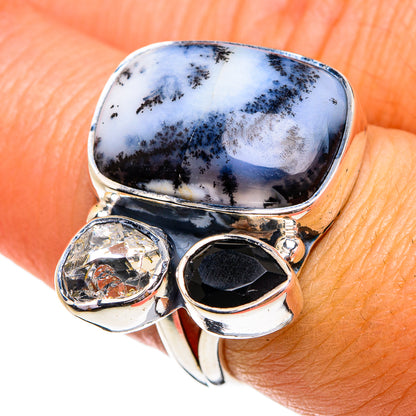 Dendritic opal and gemstone ring with oval white-blue cabochon and dark onyx side stones