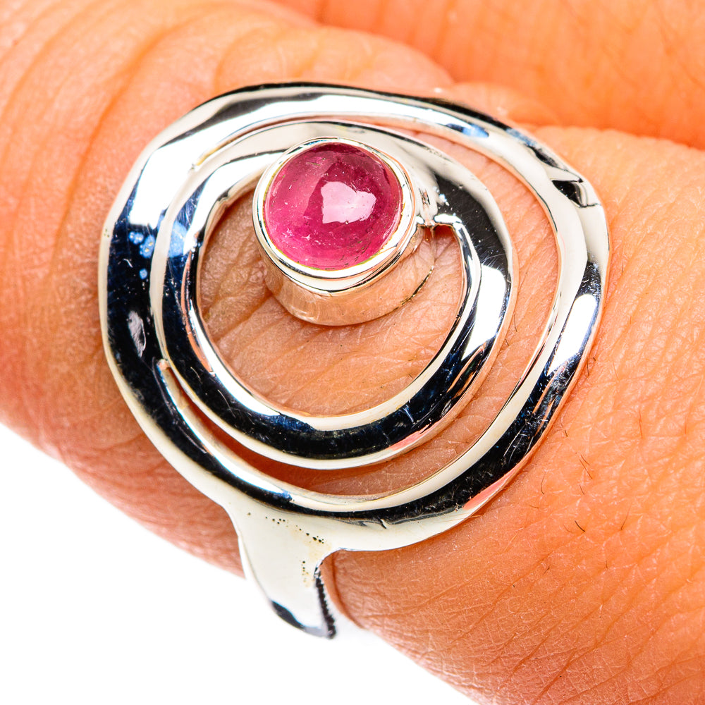 Pink tourmaline sterling silver ring, round bezel-set stone in swirling frame
