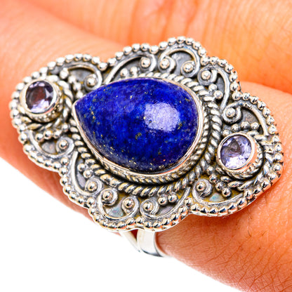 Sterling silver lapis lazuli ring with oval blue stone and round purple accents