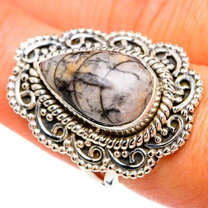 925 sterling silver oval fossil-stone ring with ornate filigree and dark gray marbling
