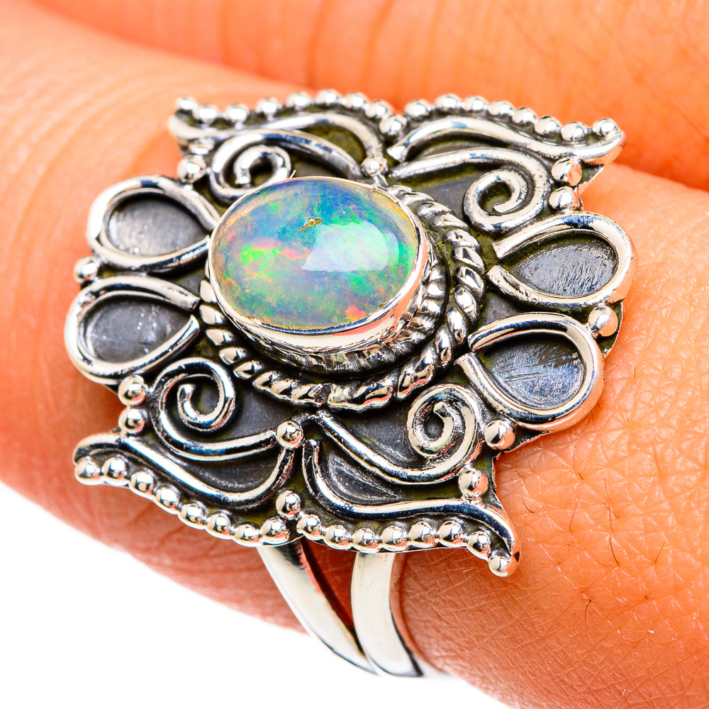 Sterling silver opal ring, oval rainbow opal center with dark oval side stones