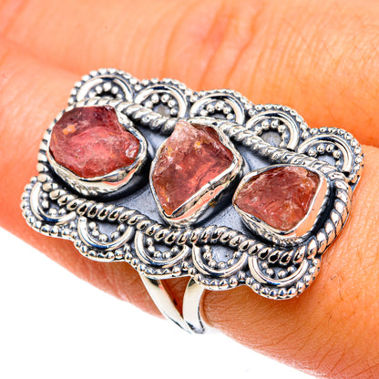 Rough pink tourmaline ring with three bezel-set stones in ornate 925 silver setting