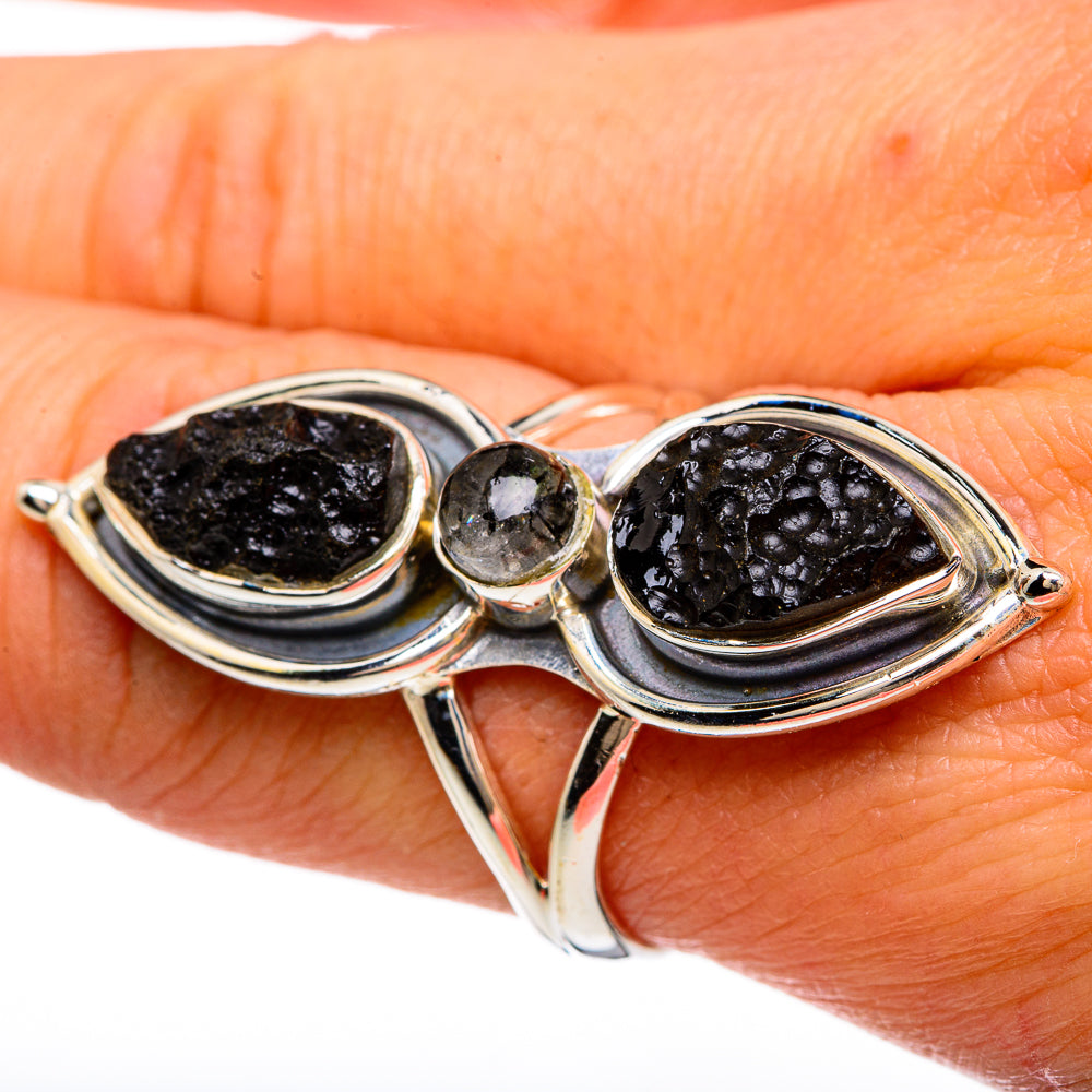 Sterling silver ring with two tektite-style marquise stones and round crystal accent