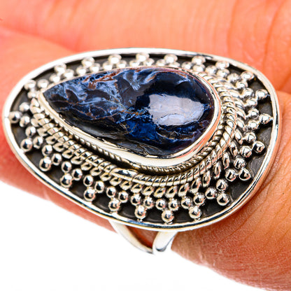 Oval blue pietersite cabochon ring in 925 sterling silver with raised beadwork border