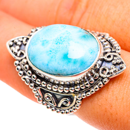 Larimar gemstone ring with oval blue stone and ornate sterling-silver filigree, size 7.25.