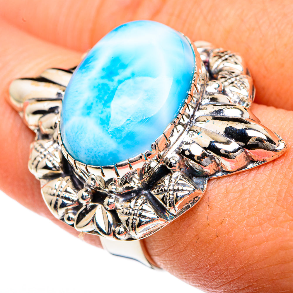 Sterling silver ring with large oval blue larimar stone and ornate bezel