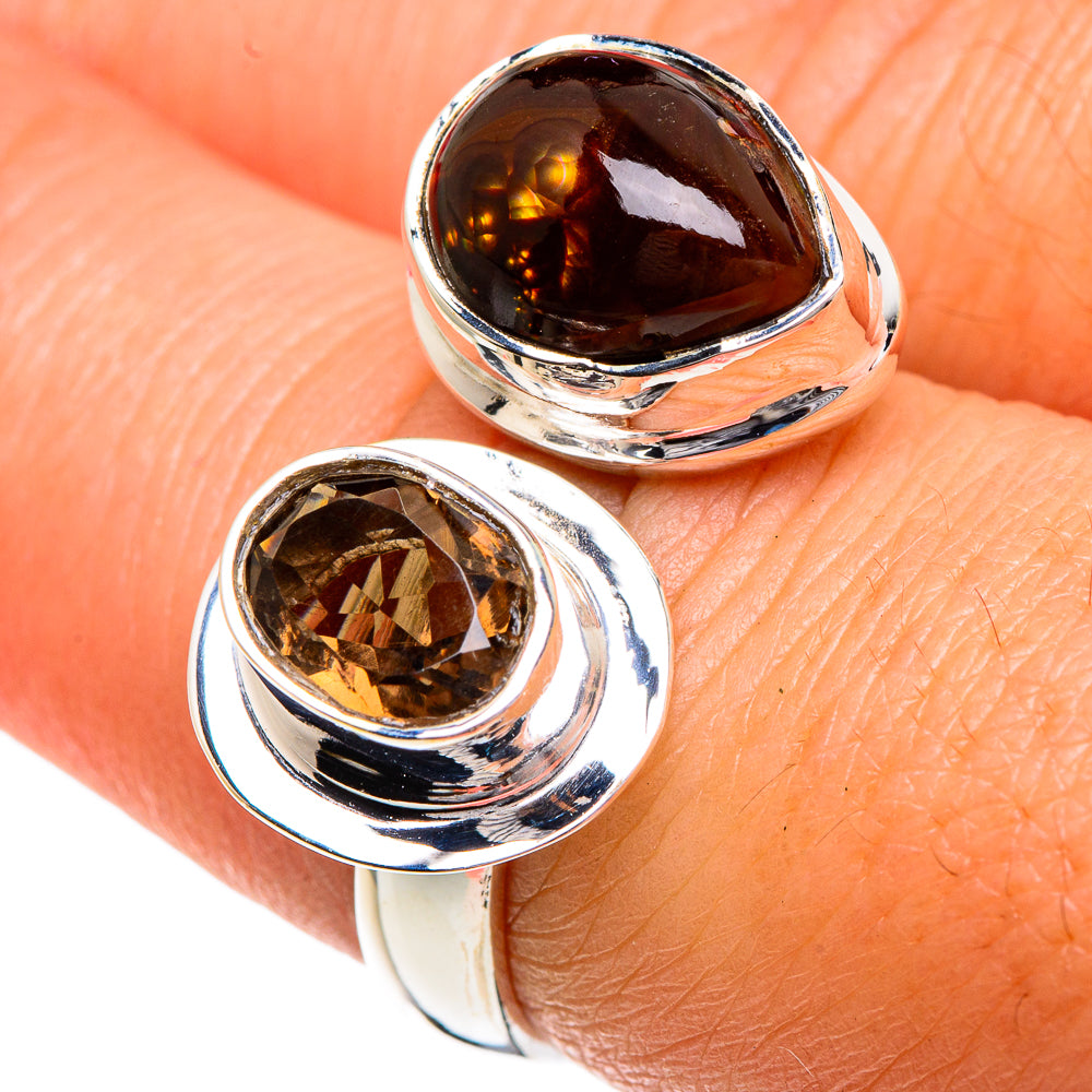 Adjustable sterling silver ring with oval dark amber and round brown gemstones