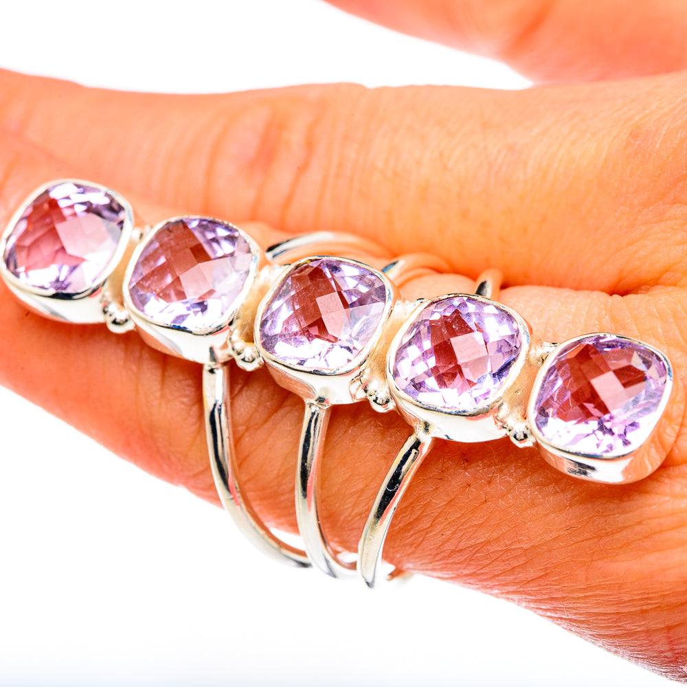 Amethyst faceted oval-stone ring on hand, 925 sterling silver with prongs