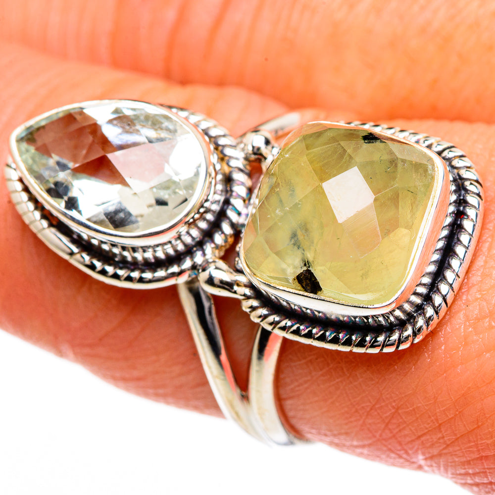 Sterling silver ring with two oval green stones, rope bezel and openwork band