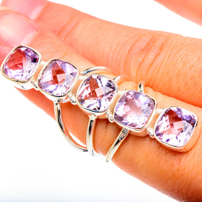Faceted amethyst ring with five round-corner square stones on a hinged open band, silver tone