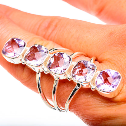 Faceted amethyst oval stones ring, silver-tone prong setting, close-up view