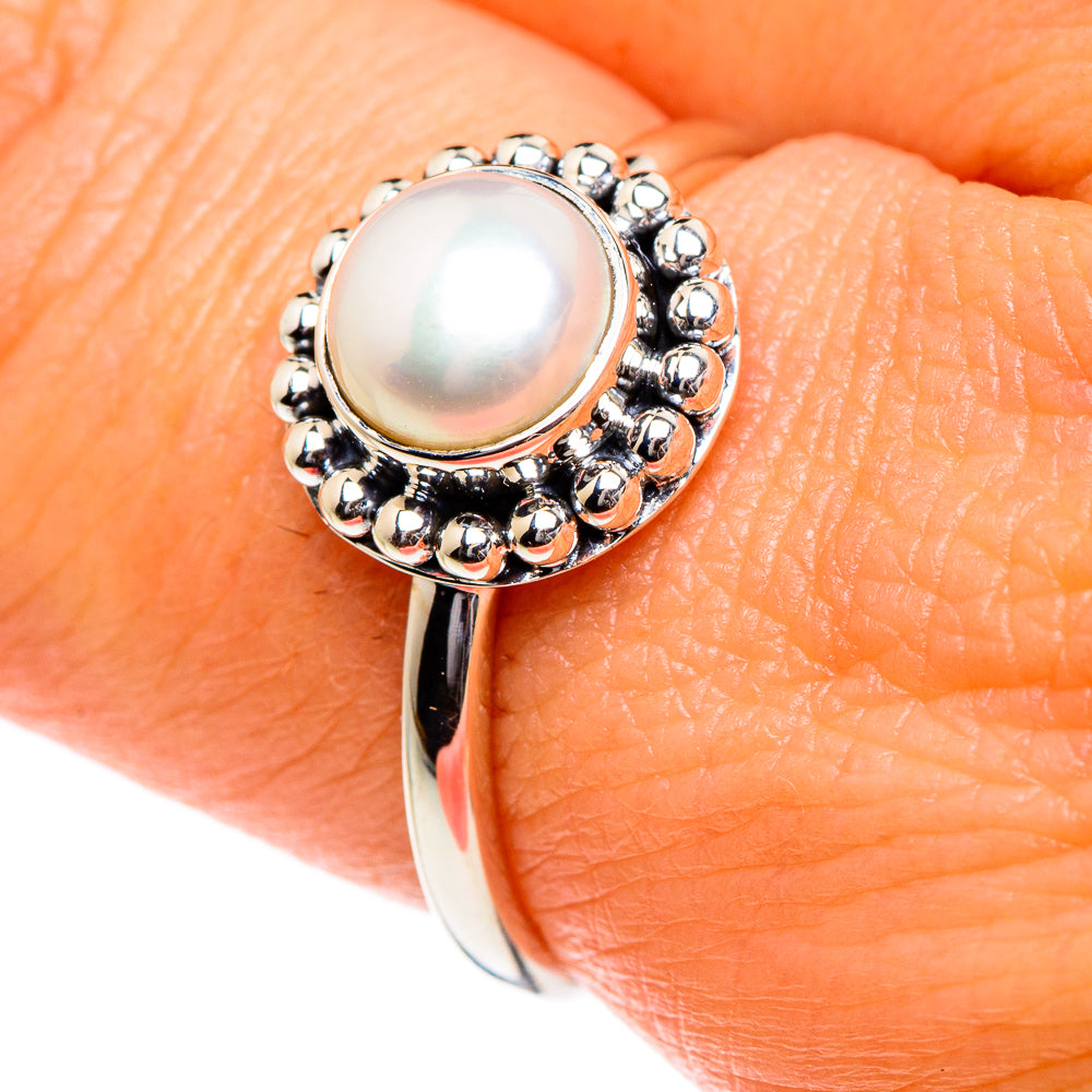 Sterling silver cultured pearl ring with round pearl bezel and bead halo