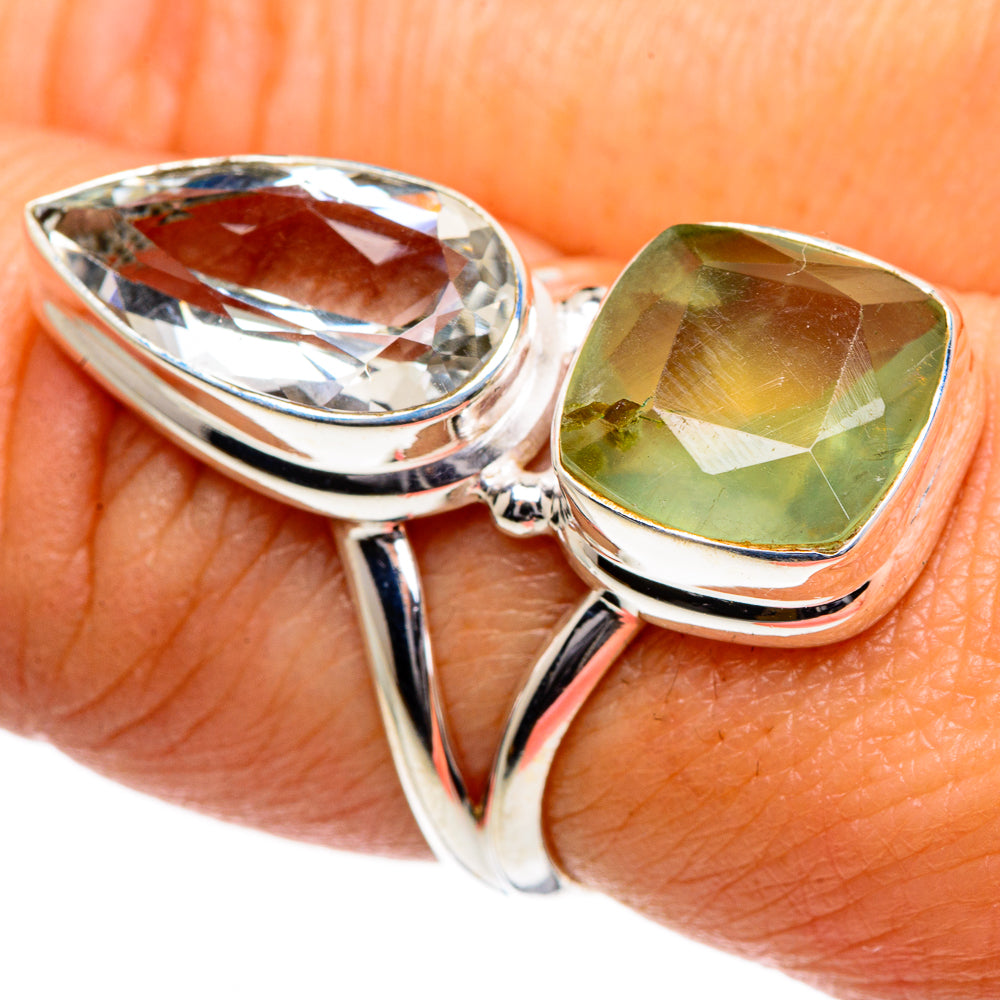 Sterling silver ring with large oval faceted green gemstone and clear stone, double