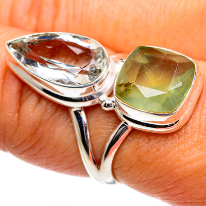 Sterling silver ring with large oval faceted green gemstone and clear stone, double