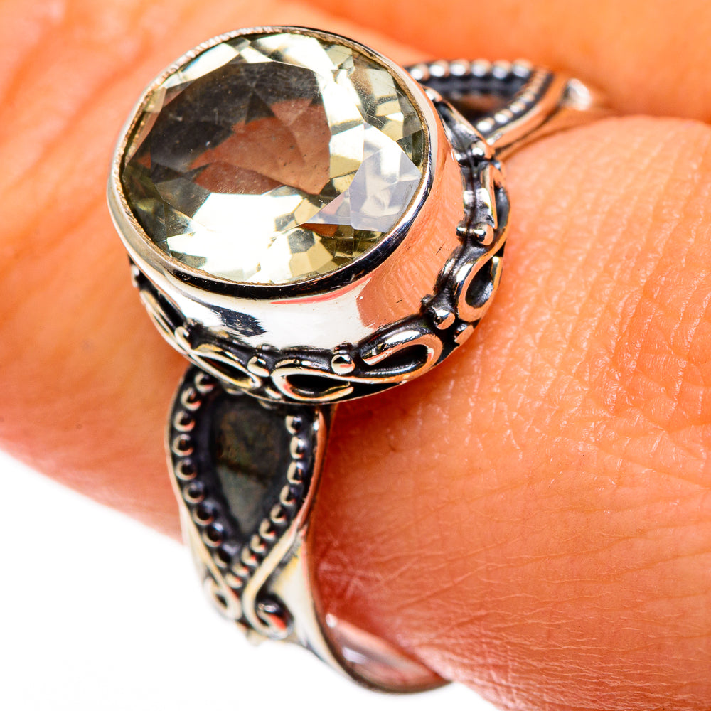 Green amethyst faceted ring with ornate sterling silver setting, round gemstone top